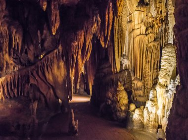 Cave stalactites, stalagmites, and other formations at Luray Caverns, Virginia. clipart