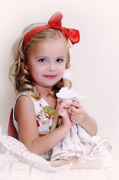 Little Beautiful Blonde Girl Curls Plays Vintage Doll — Stock Photo, Image