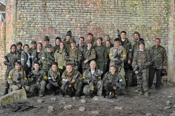 St. Petersburg, RUSSIA 20.06.2014 Open-air paintball tournament at the end of summer in nature, People in camouflage, with paintball guns and masks