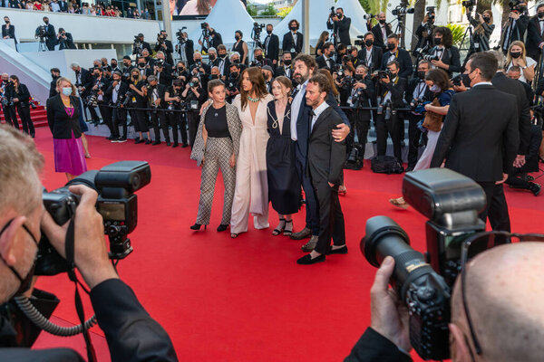 CANNES, FRANCE - JULY 10, 2021: Marion Cotillard, Mary Finn, Director Flore Vasseur, Melati Wijsen, Mohamad Aljounde and Denis Carot attend the "De Son Vivant (Peaceful)" screening during the 74th annual Cannes Film Festival