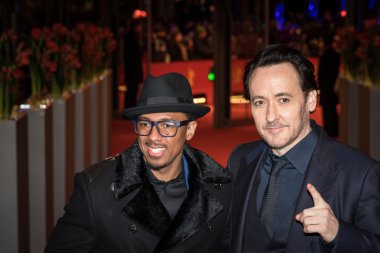 Actors Nick Cannon and John Cusack