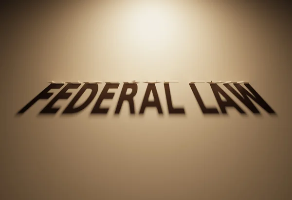Representación 3D de un texto en la sombra que lee la Ley Federal — Foto de Stock