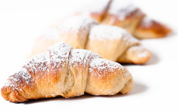 Vynikající croissanty na bílém pozadí Royalty Free Stock Fotografie