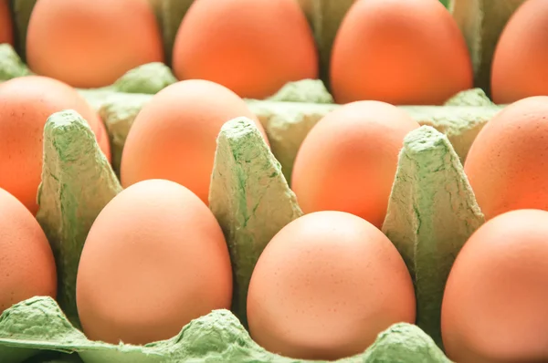 Eggs in green cartone — Stock Photo, Image