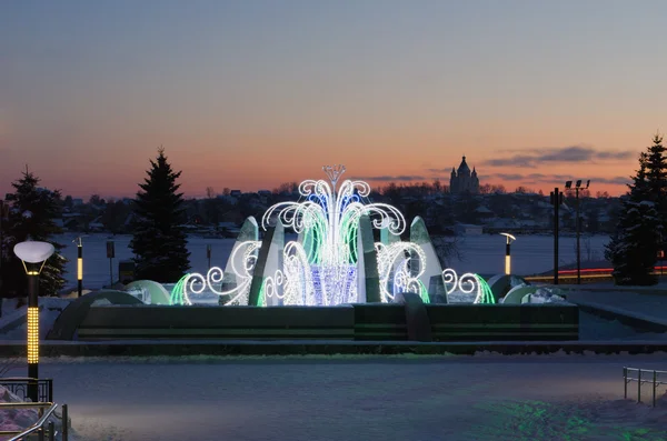 Fountain in the winter, with night New Year's illumination — Stock Photo, Image