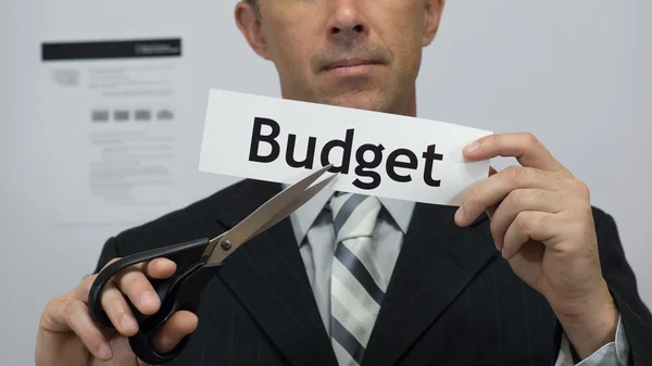 Businessman Cuts Budget Concept — Stock Photo, Image