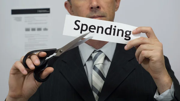 Businessman Cuts Spending Concept — Stock Photo, Image