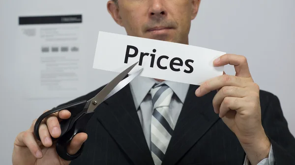 Businessman Cuts Prices Concept Stock Picture