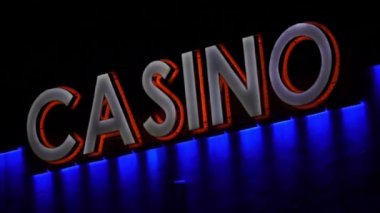 Casino işareti ışıkları Closeup el yol açtı.
