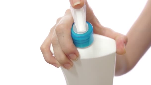 Woman Pumping Beauty Cream Into Hand — Stock Video