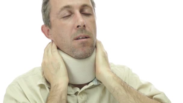 Male In Neck Support Brace With Pain — Stock Video