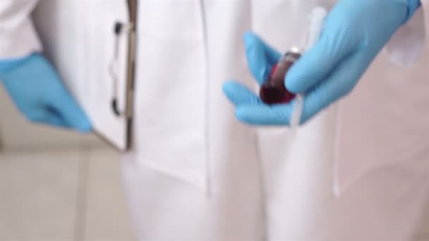 Doctor With Syringe and Vial of Medicine — Stock Video