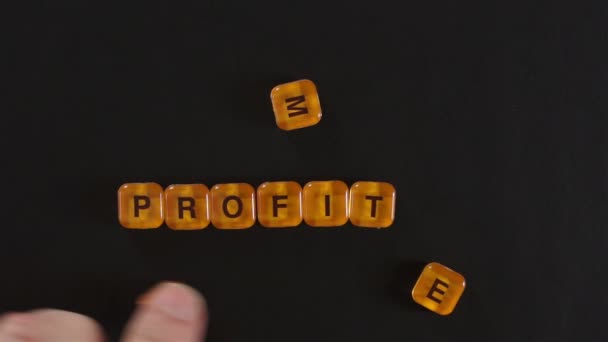 Letter Blocks Spelling More Profit — Stock Video