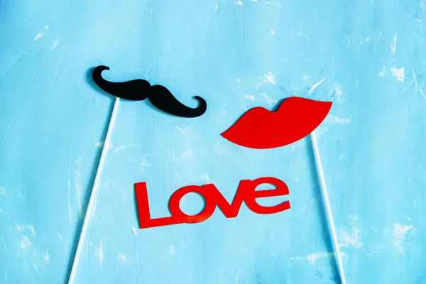 Couple Paper Mustache Lips Props Stick Word Love Blue Background — Stock Photo, Image