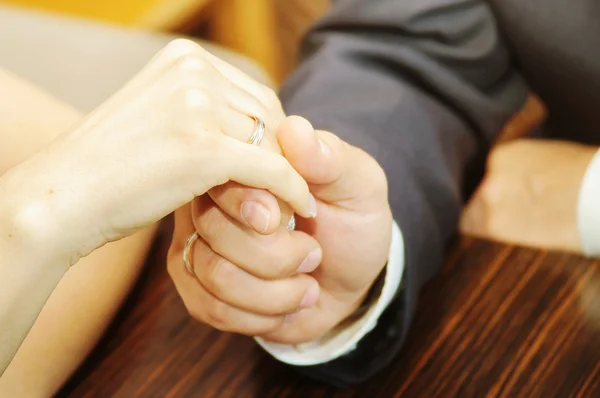 Wedding couple holding hands — Stock Photo, Image