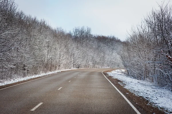 Beautiful winter landscape with a highway — Stock Photo, Image