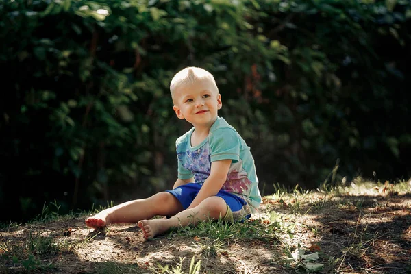 Barefoot Boy Sits Sand Royalty Free Stock Images