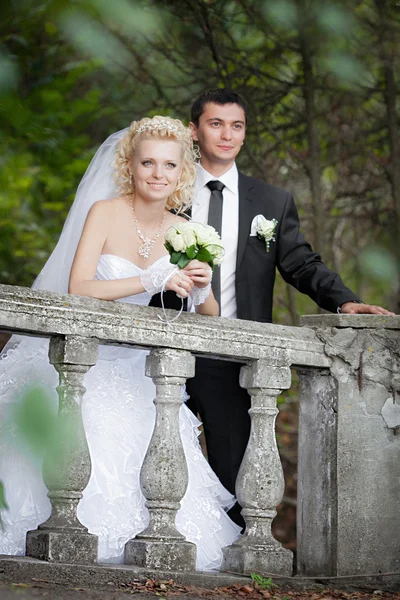 Couple in love bride and groom together in bridal summer day enjoy a moment of happiness and love — Stock Photo, Image