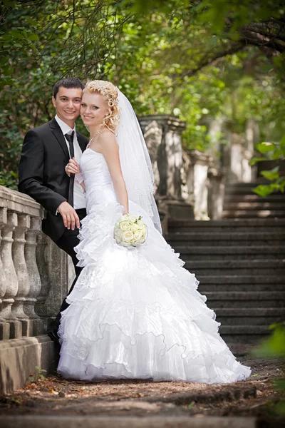 Couple in love bride and groom together in bridal summer day enjoy a moment of happiness and love — Stock Photo, Image