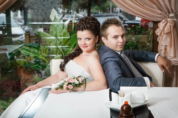 Groom and bride in cafe — Stock Photo, Image