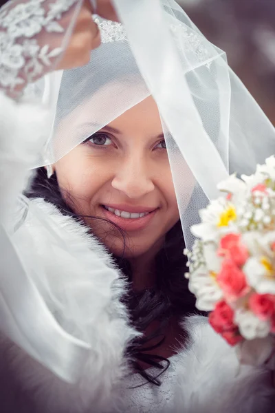 Happy bride in autumn park — Stock Photo, Image