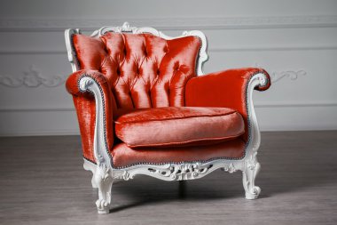 Red armchair in the room clipart