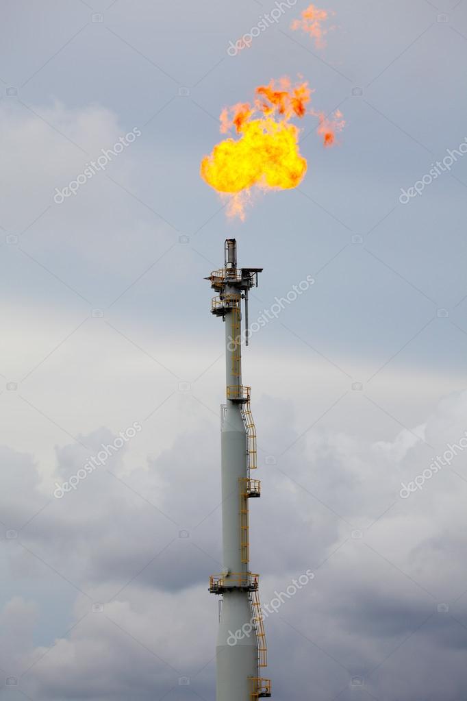 Flare Stack at Oil and Gas Refinery Plant Stock Photo by ©meepoohfoto