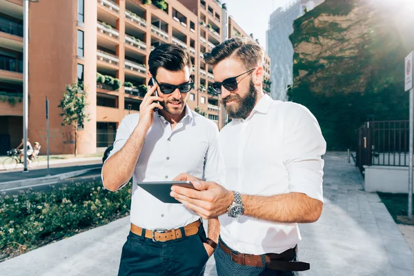 Modern businessmen using devices — Stock Photo, Image