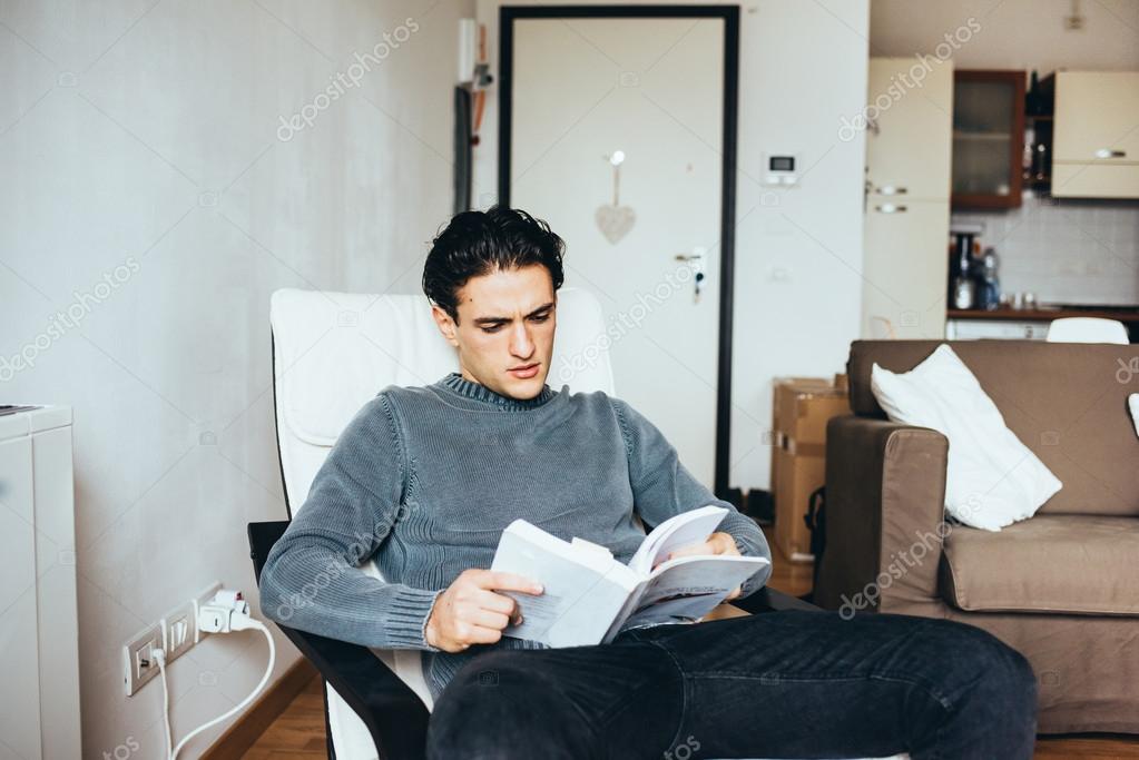 Man sitting on armchair Stock Photo by ©peus 110662302