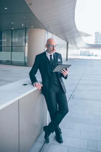 Contemporary businessman in city — Stock Photo, Image