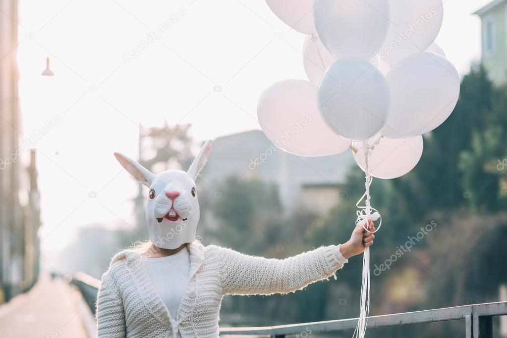 woman wearing rabbit mask