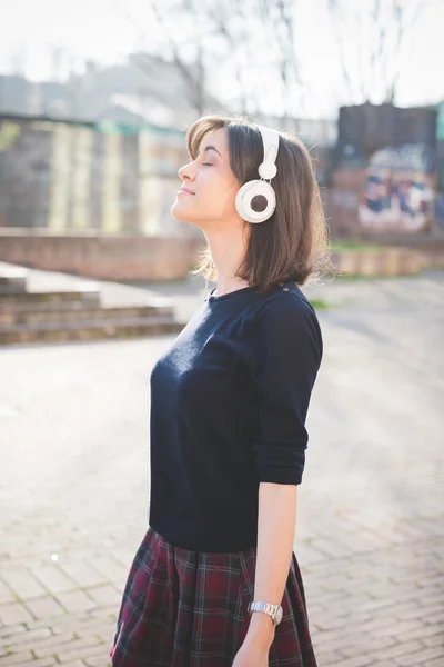 Girl listening music with headphones — Stock Photo, Image