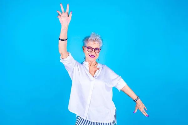 Grandmother Caucasian Dancing Colored Background Crazy Funny Old Woman Clubbing — Stock Photo, Image