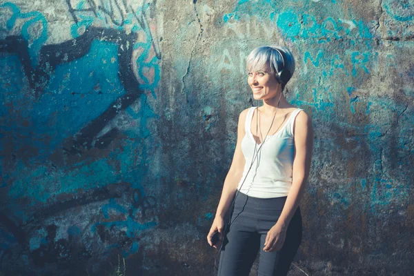 Hipster woman with headphones — Stock Photo, Image