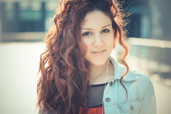 Young beautiful hipster woman with red curly hair — Stock Photo, Image