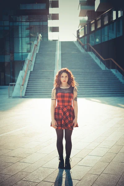 Young beautiful hipster woman with red curly hair — Stock Photo, Image