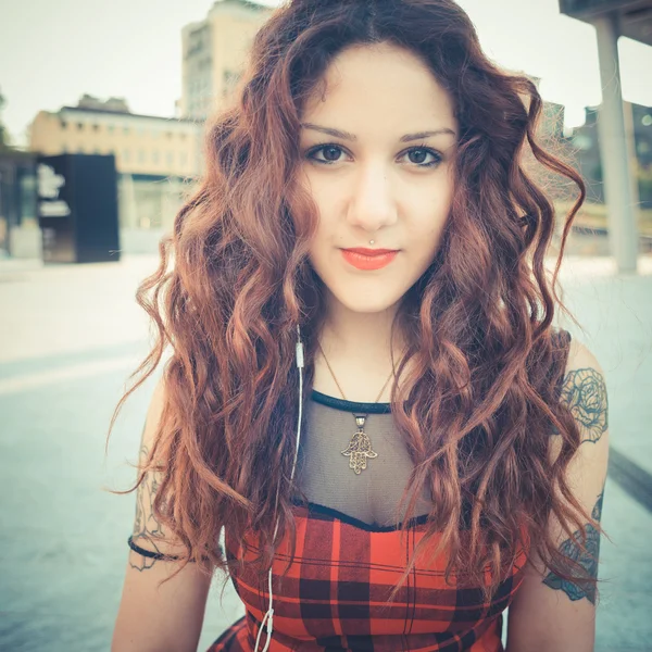 Young beautiful hipster woman with red curly hair — Stock Photo, Image