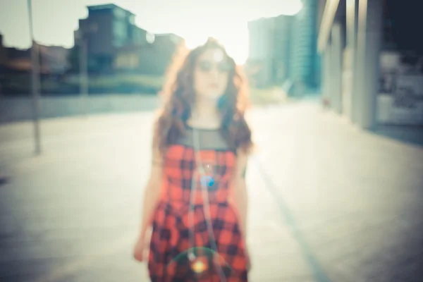 Young beautiful hipster woman with red curly hair — Stock Photo, Image