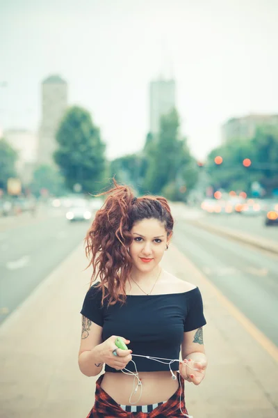 Young beautiful hipster woman with red curly hair — Stock Photo, Image