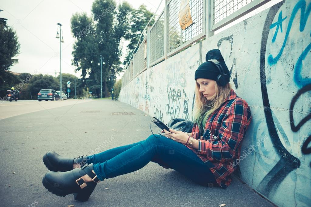 Woman hipster listening music