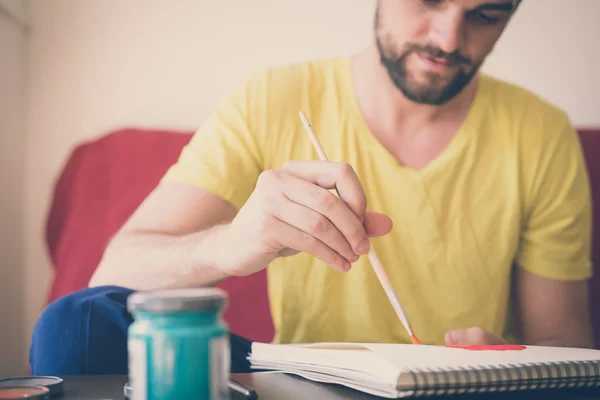 Vacker hipster moderna människan målning — Stockfoto