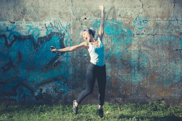 Hipster woman with headphones music — Stock Photo, Image