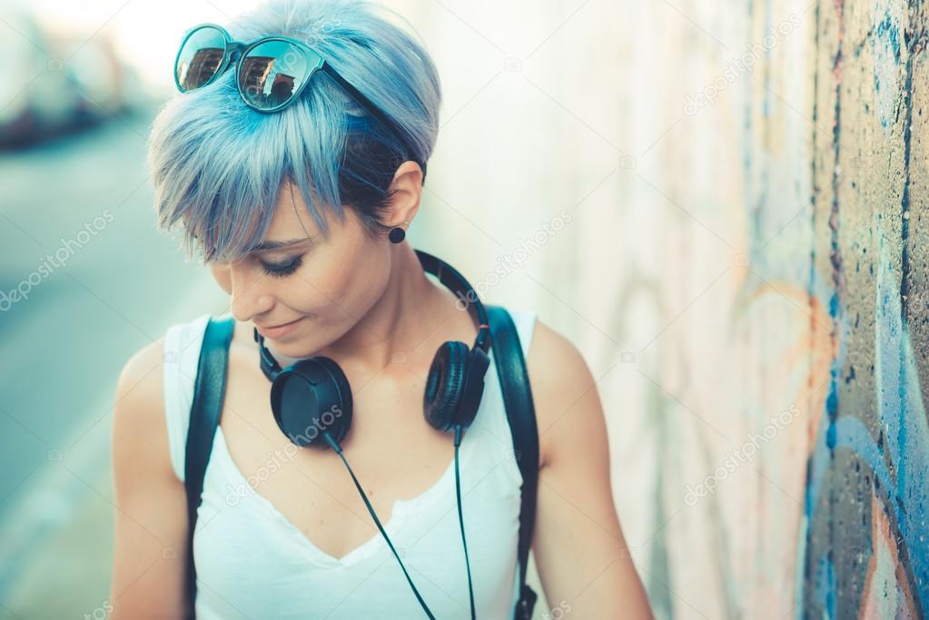 Hipster woman with headphones music