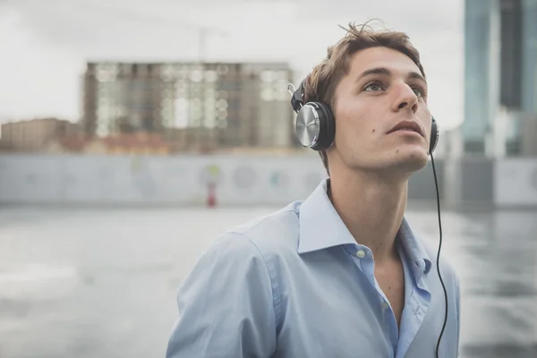 Young model hansome blonde man with headphones — Stock Photo, Image