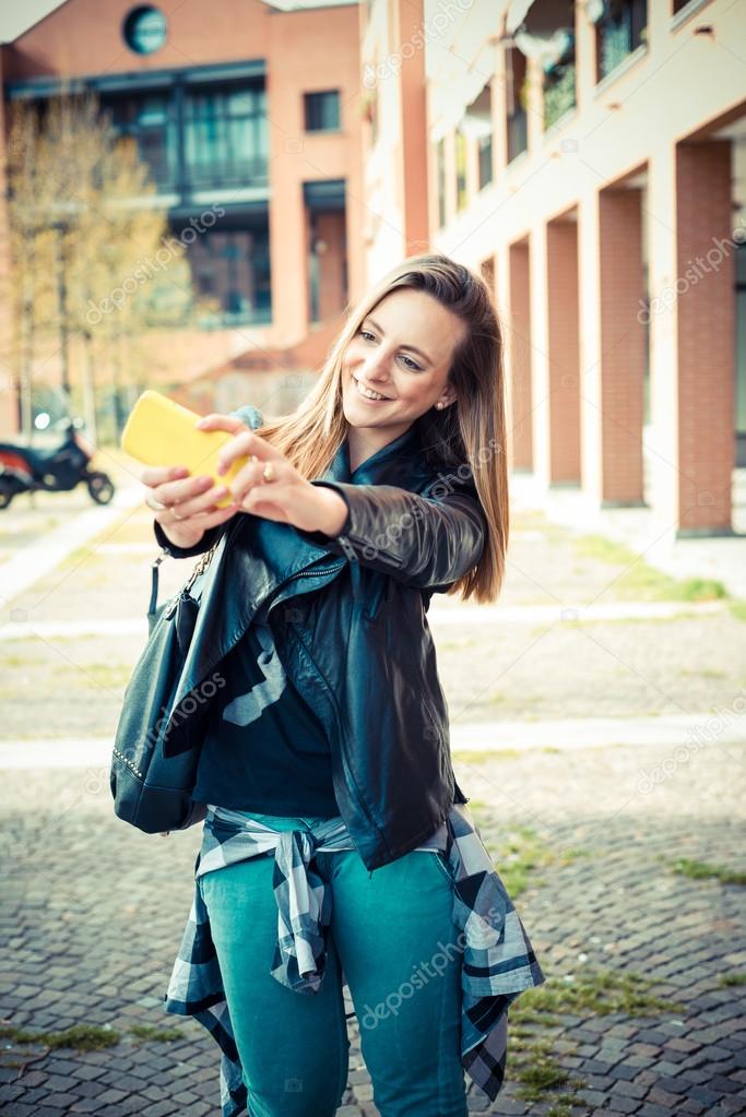 Woman making selfie on her smart phone