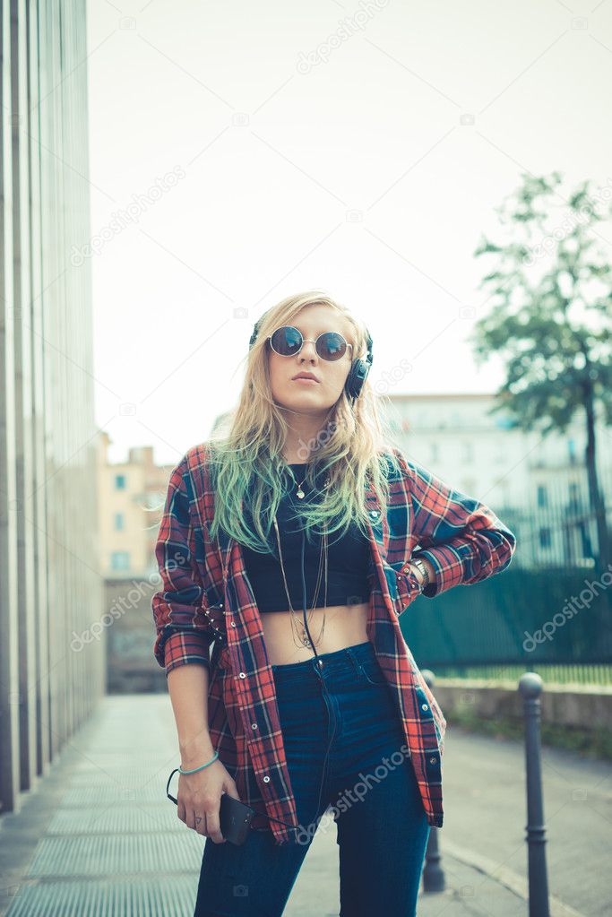 Woman hipster listening music