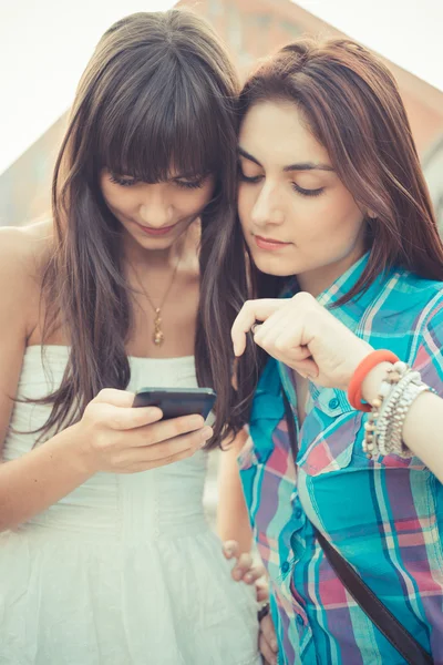 Beautiful hipster young women sisters friends — Stock Photo, Image