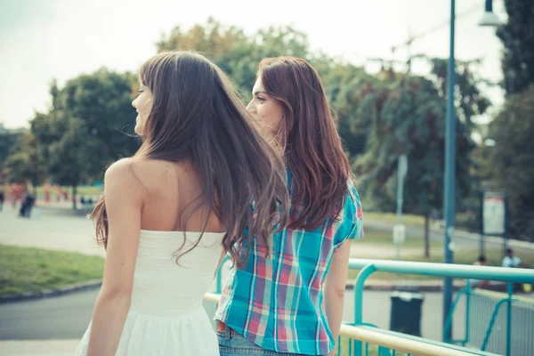 Beautiful hipster young women sisters friends — Stock Photo, Image