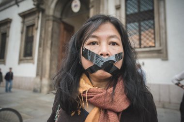 Exiled Thai activist Junya Lek Yimprasert in Milan on octo clipart
