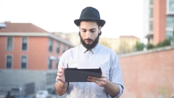 Bearded man using tablet — Stock Video